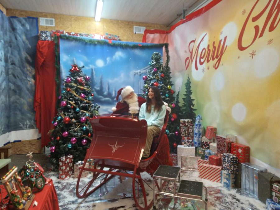 Cavelero student Chloe Reynolds discusses what they want for Christmas with Santa Claus. When they reply not knowing what they want, Santa asks if they want a boyfriend. When replying with no, the two joke around and have a good laugh. 

