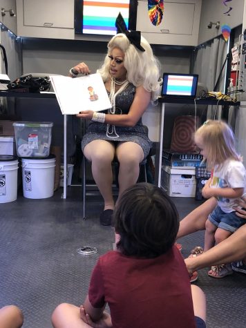 A drag queen leads a storytelling event at the San Jose Public Library (CreativeCommons)
