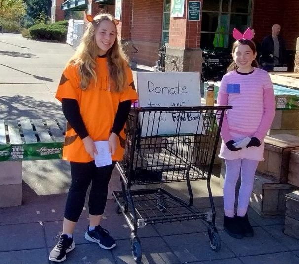 Amanda Pfiester and Andi Heininger dressed up for a Halloween food drive, donated to the local food bank.(Photo courtesy of Christine Pfiester)