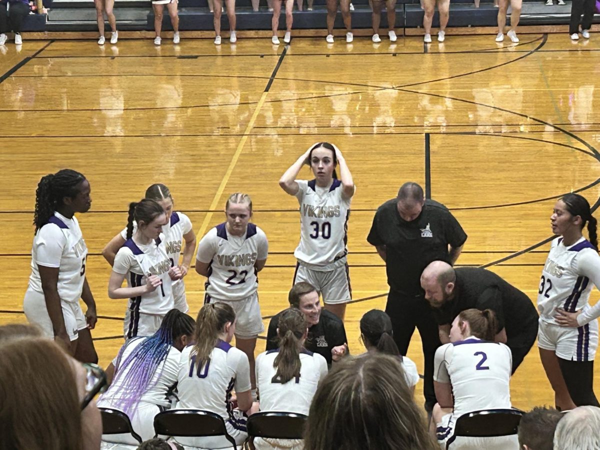 LSHS girls basketball team in timeout after request from LSHS head coach.